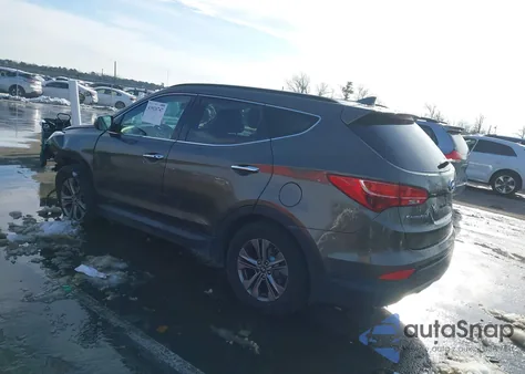 2014 Hyundai Santa Fe Sport 2.4L z USA, uszkodzony, nr VIN 5XYZUDLB5EG136383